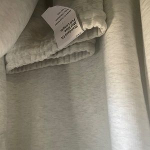 brand new women's Nike tech ( sweater is "over size style")